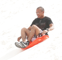Sledding at White Sands National Monument
